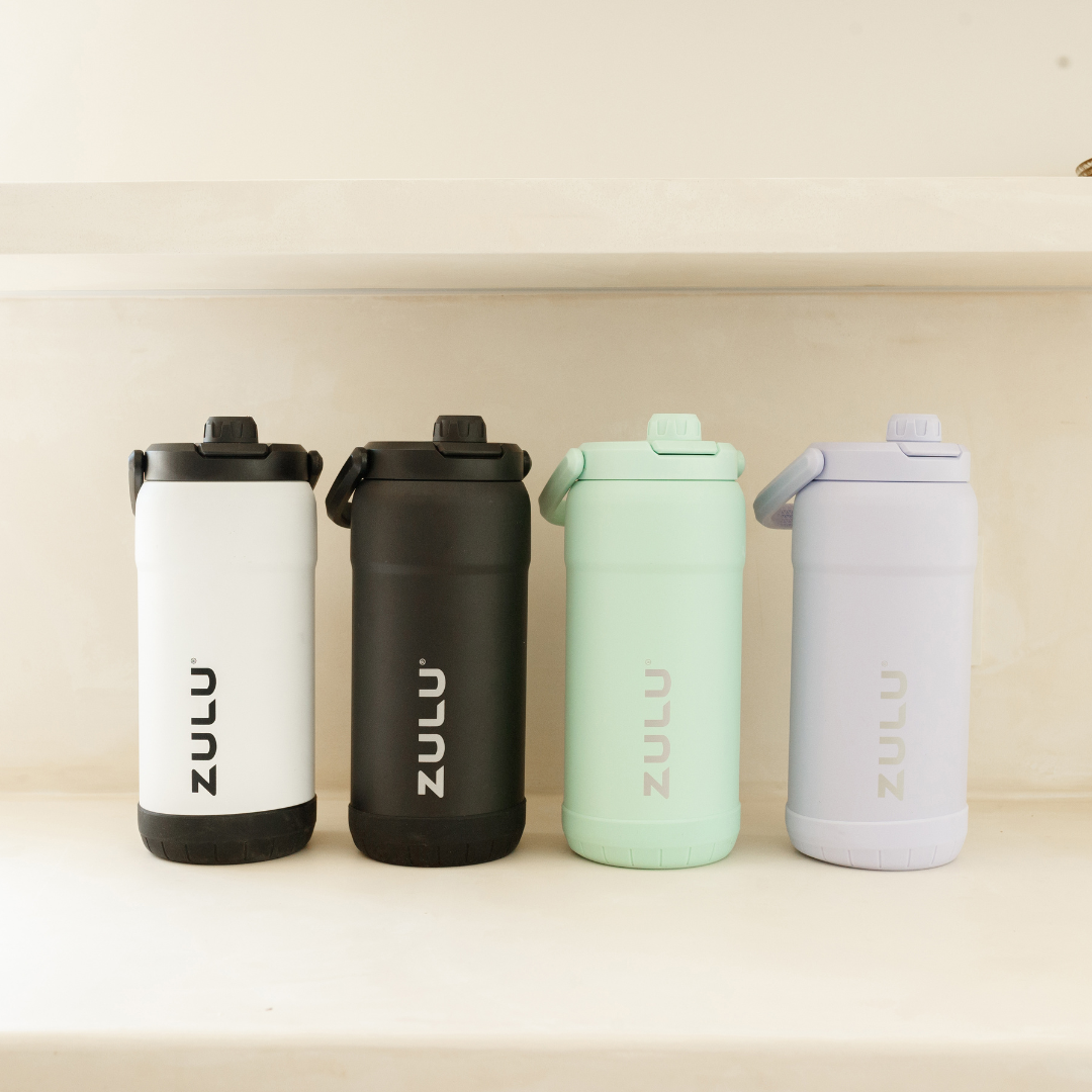 goals-mammoth-101oz-stainless-steel-bottle-y9 GoalsMammothAllColorsLifestyle.png